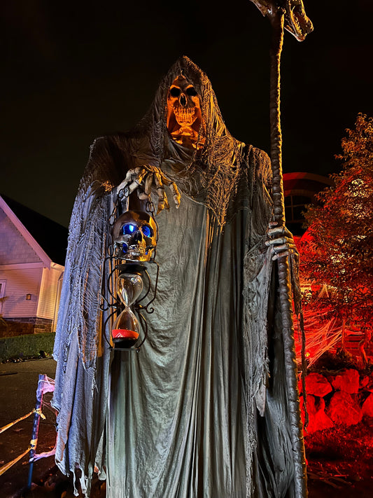 Grim Reaper Halloween sculpture with head and hands made from Pal Tiya Premium fortified cement sculpting material.