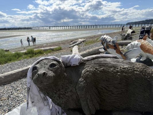Multi-day Pal Tiya Premium seal pup sculpture showing scratch coat stage