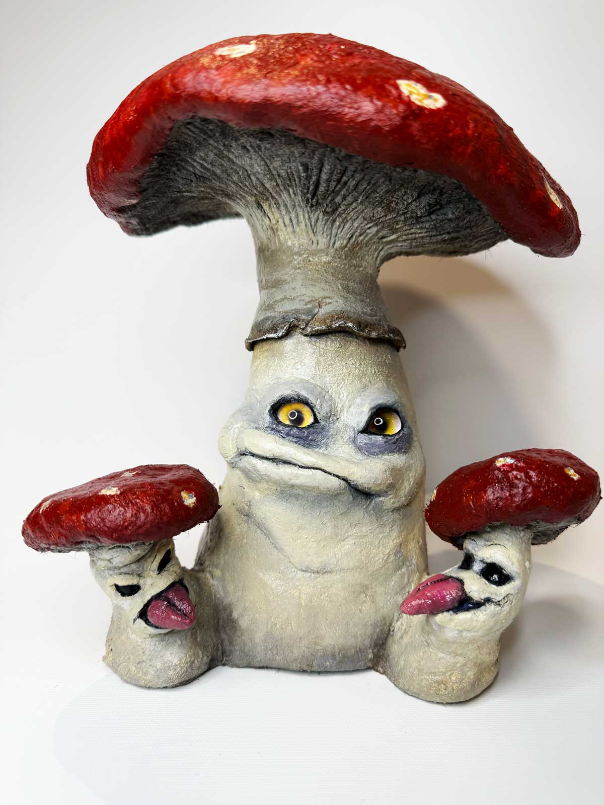 Pal Tiya Premium cement clay mushrooms figurine with a face on a white background